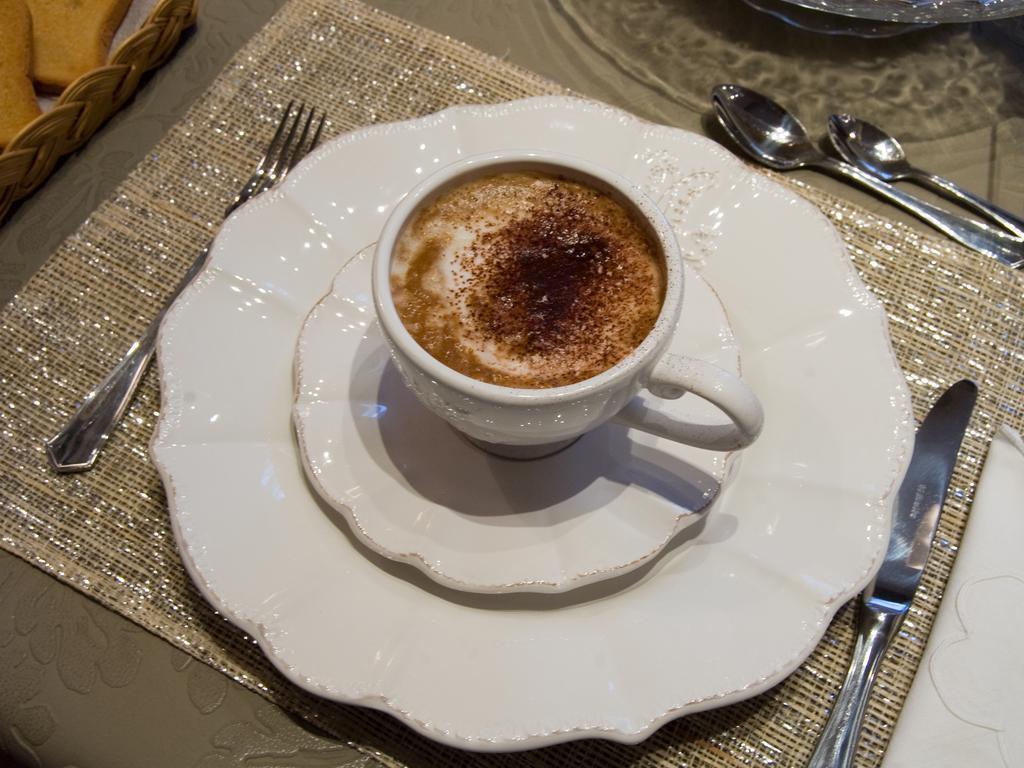 Acomodação com café da manhã  Les Suites